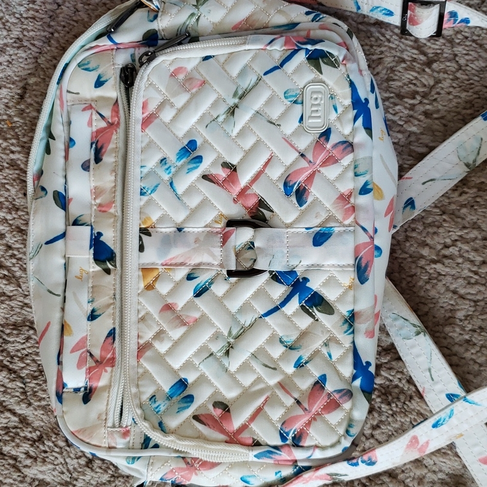 Lug carousel XL white with multicolor dragonfly crossbody purse.